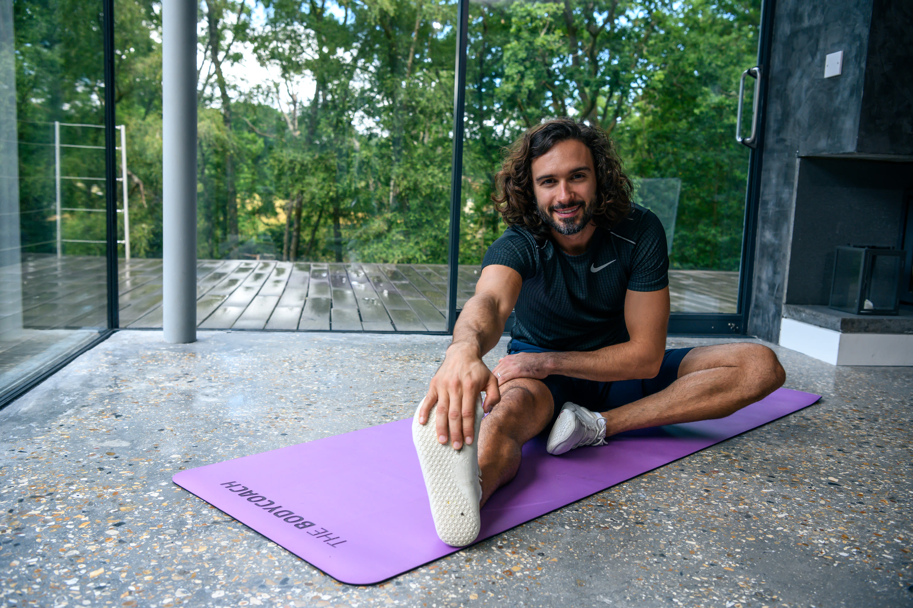 Joe stretching on mat